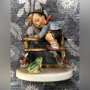 Goebel M.I. Hummel piece titled "Retreat to Safety"